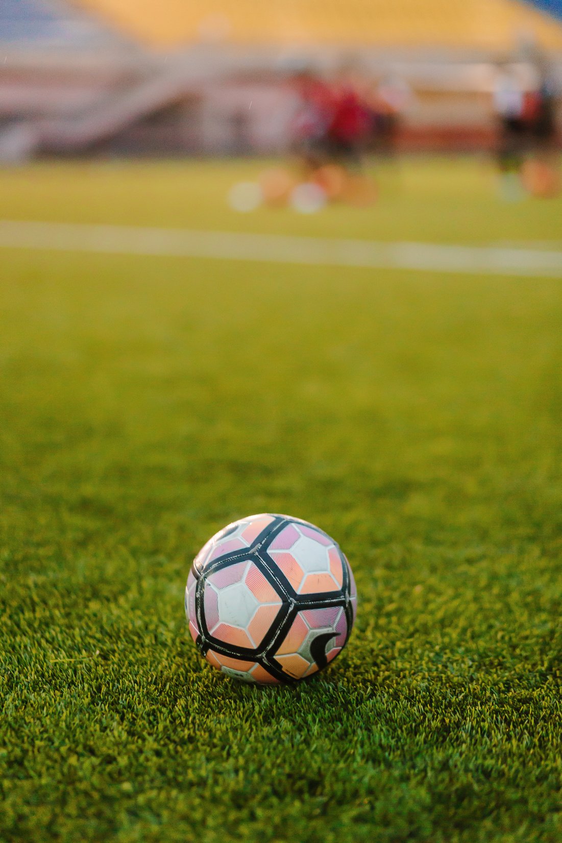 A Soccer Ball on Green Grass Field